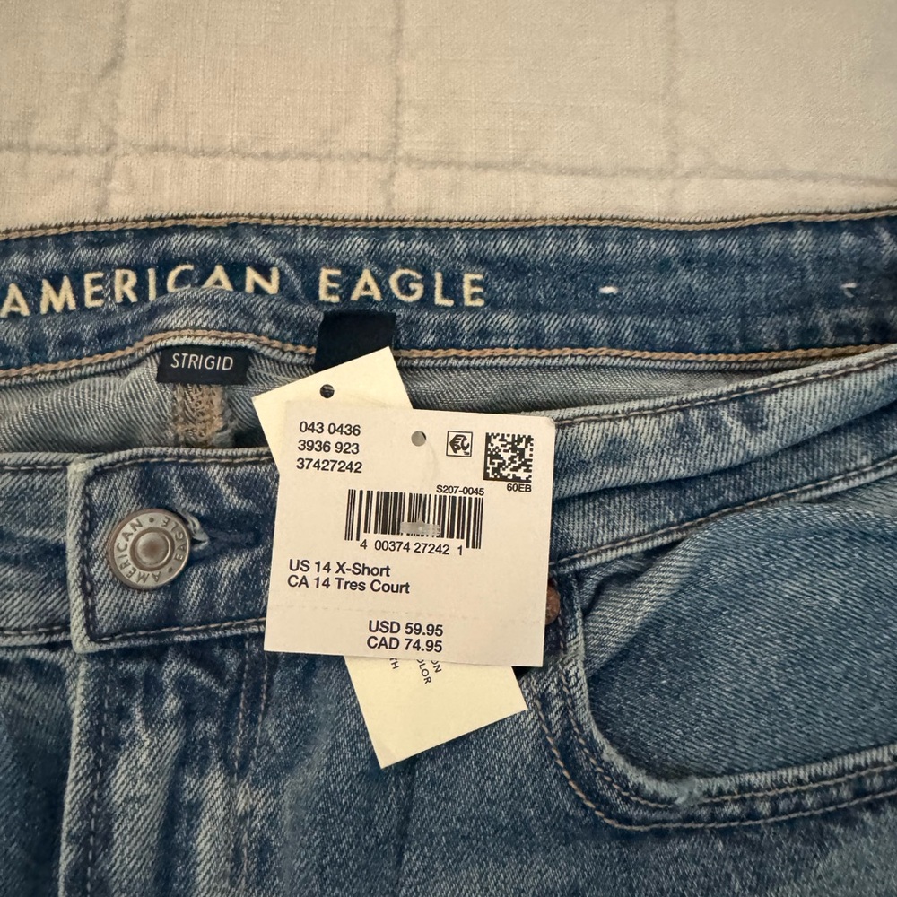 American Eagle. Straight leg. Holes/patches.